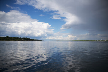 Clouds over a river on a summers day