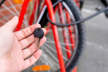 locks for a bicycle. keys on the background of a bicycle. Protecting a mountain bike from theft