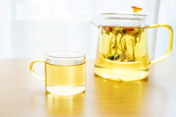 Herbal health tea brewed on the table