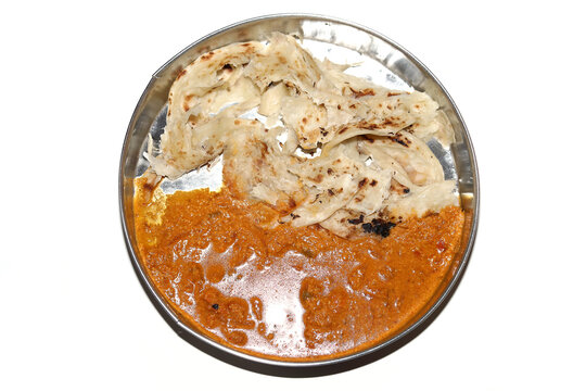 Parotta with Chicken kurma, paratha kurma is a delicacy from the state of Kerala, tamilnadu south India. kurma is mixed veg south Indian curry