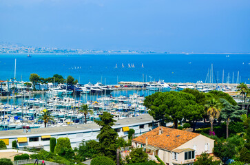 Fototapeta na wymiar Landscape of the beautiful Marina Baie des Anges on against backdrop of Mediterranean Sea with yachts and sailboats. Villeneuve-Loubet. France.