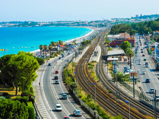 Road and railways along the Mediterranean towards Antibes. View from above. France.