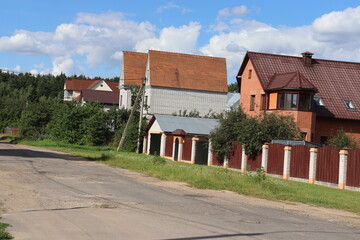 rural road  with posh cottages view