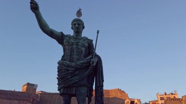 Statue of Roman Emperor Augustus with a seagull on his head.