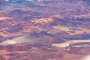 Aerial view of snow capped volcanic peaks in the Atacama Desert, Chile