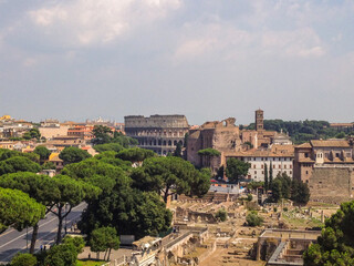 Fototapeta na wymiar Ruins of old Rome with many historical buildings and temples.