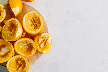 Oranges squeezed in a juicer