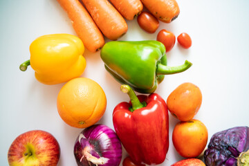 Colorful healthy vegetable and fruit food on white background