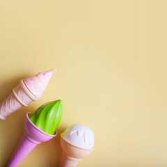 Abstract ice cream on a yellow background with copy space. Summer food concept