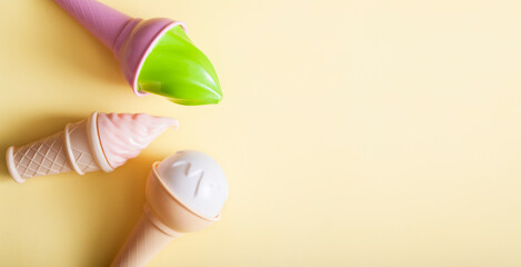 Abstract ice cream on a yellow background with copy space. Summer pop art concept