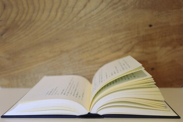 Close-up of books open on the library desk selective focus and shallow depth of field