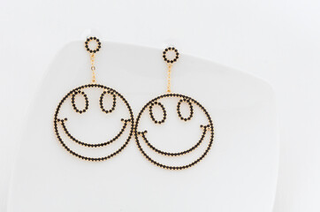 Close up of diamond earrings. space for your text.