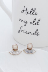 Close up of diamond earrings. space for your text.