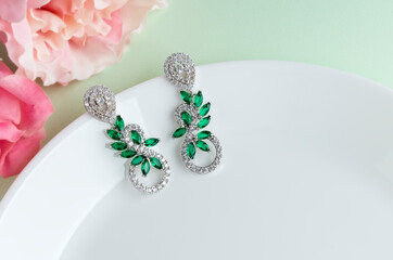 Close up of diamond earrings. space for your text.