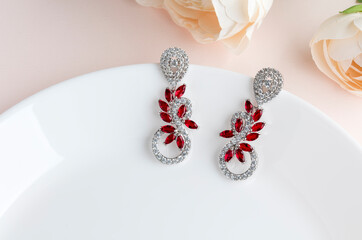 Close up of diamond earrings. space for your text.