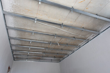 Ceiling frame construction in new home. Installing suspended ceiling