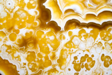 Onyx texture background of natural stone with polished yellow streaks. marble texture used for indoor and outdoor home decoration