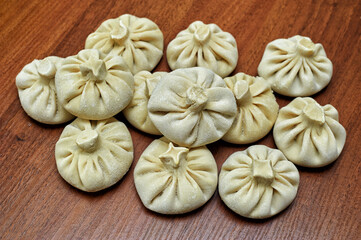 Frozen semi-finished products khinkali . Fast home food . National food