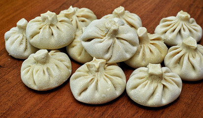 Fototapeta premium Frozen semi-finished products khinkali . Fast home food . National food
