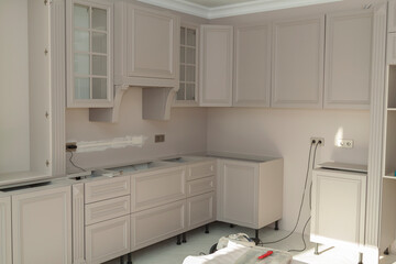 View of the new elegant corner kitchen during assembly