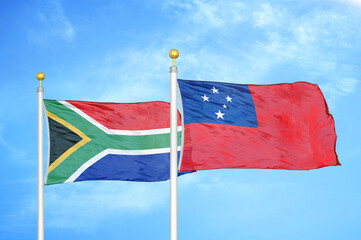 South Africa and Samoa two flags on flagpoles and blue sky
