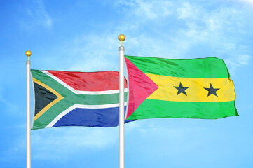 South Africa and Sao Tome and Principe two flags on flagpoles and blue sky
