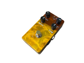 Isolated Brown and gold stompbox electric guitar effect for studio and stage performed on white...