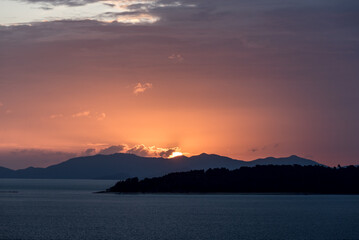 Beautiful first light from sunrise with orange sky  