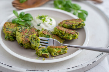 healthy home made vegan kale patties on a table