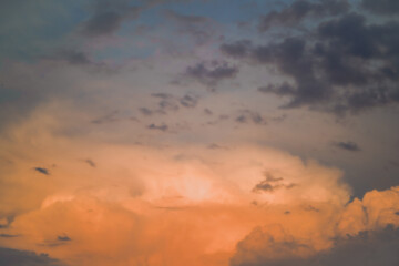 Orange sunset sky. Cloudy abstract background. Sunset colors.