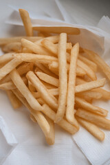 heap of fried potatoes isolated on white background, top view