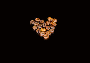 Coffee beans on the black background