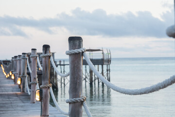 Obraz premium rope on the wooden pier