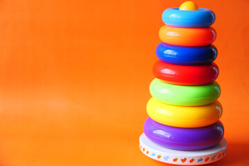 Baby toys on color background. Child development concept.