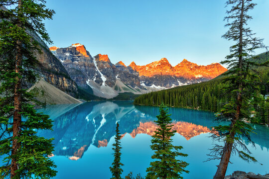 Golden Sunrise Over the Canadian Rockies at Moraine Lake in Canada © ronniechua