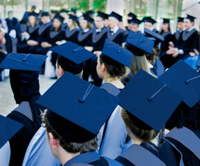 Young students attend graduation ceremony at their school