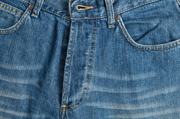 Blue Denim jeans close up detail. Textures and backgrounds. Fashion and casual trendy clothing