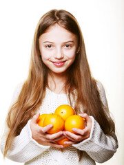 child with an oranges