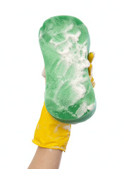 Hand in yellow rubber glove soap foam large green sponge white background