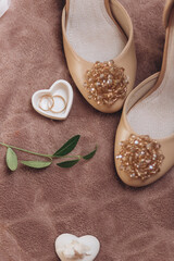 Wedding rings with bride shoes