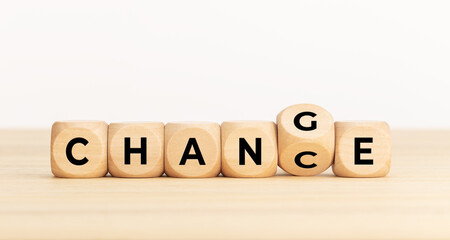 Flip wooden cube with word change to chance, Growth, Personal development and career growth copcepts. Copy space