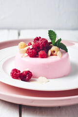 Raspberry panna cotta dessert.