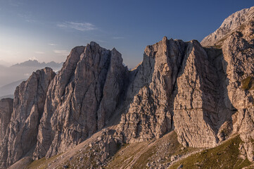 North side of Civetta mountain group as seen from A. Sonino refuge at Coldai, stage eight of Alta Via 1 classic trek in the Dolomites, Zolda Alto municipality, province of Belluno, South Tirol, Italy.
