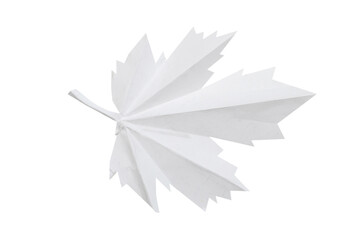 A white origami leaf in fall