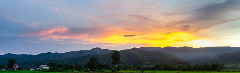 The beautiful panorama landscape,  The Twilight time sunset with colorful clouds at the top of the hill,  Phayao Northern  Thailand