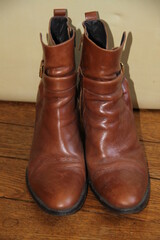 High hills brown leather boots