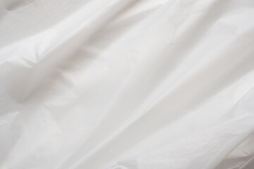 Fototapeta na wymiar White plastic bag background texture close up