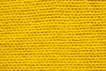 Yellow knitting wool texture background