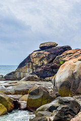 Fototapeta na wymiar Rocks on the beach for wallpaper in Konkan India