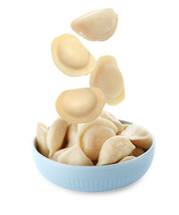 Many tasty dumplings falling into bowl on white background